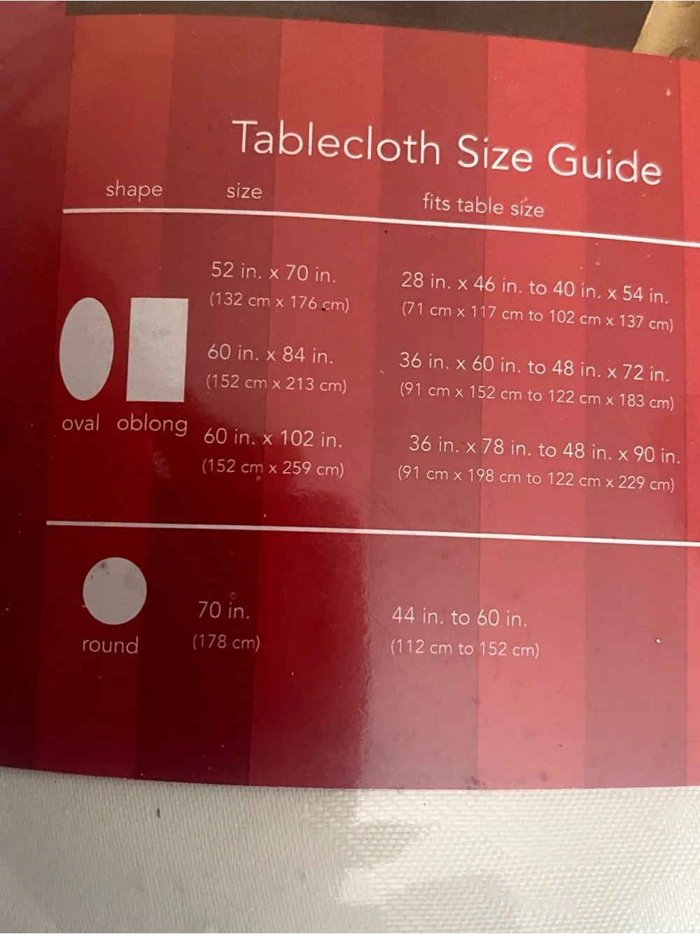 December Home satiny rectangular oblong tablecloth and 8 napkin set 60” x 102”.